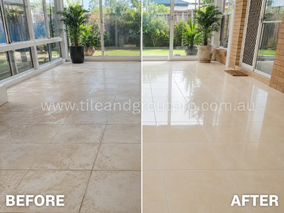 Bright sunroom with cream ceramic floor tiles before sealer stripping, showing cloudy residue and worn tile finish across the indoor entertaining area.