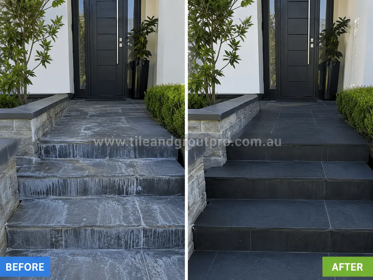 Before and after view of dark porcelain front porch tiles and stairs with visible white efflorescence streaking and residue removed through efflorescence treatment.