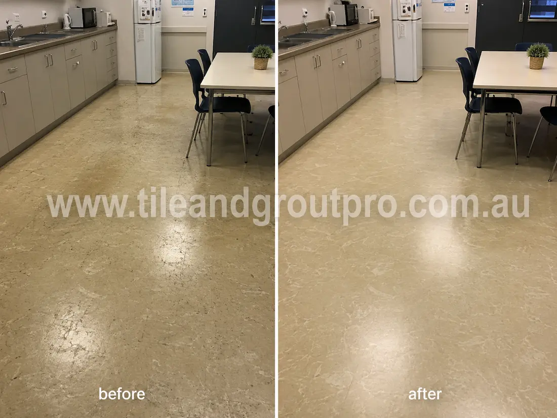 Staff breakroom with beige linoleum floors before sealer stripping, featuring surface scratches, faded sealer, traffic wear, and dull patches around tables, cabinets, and appliances.