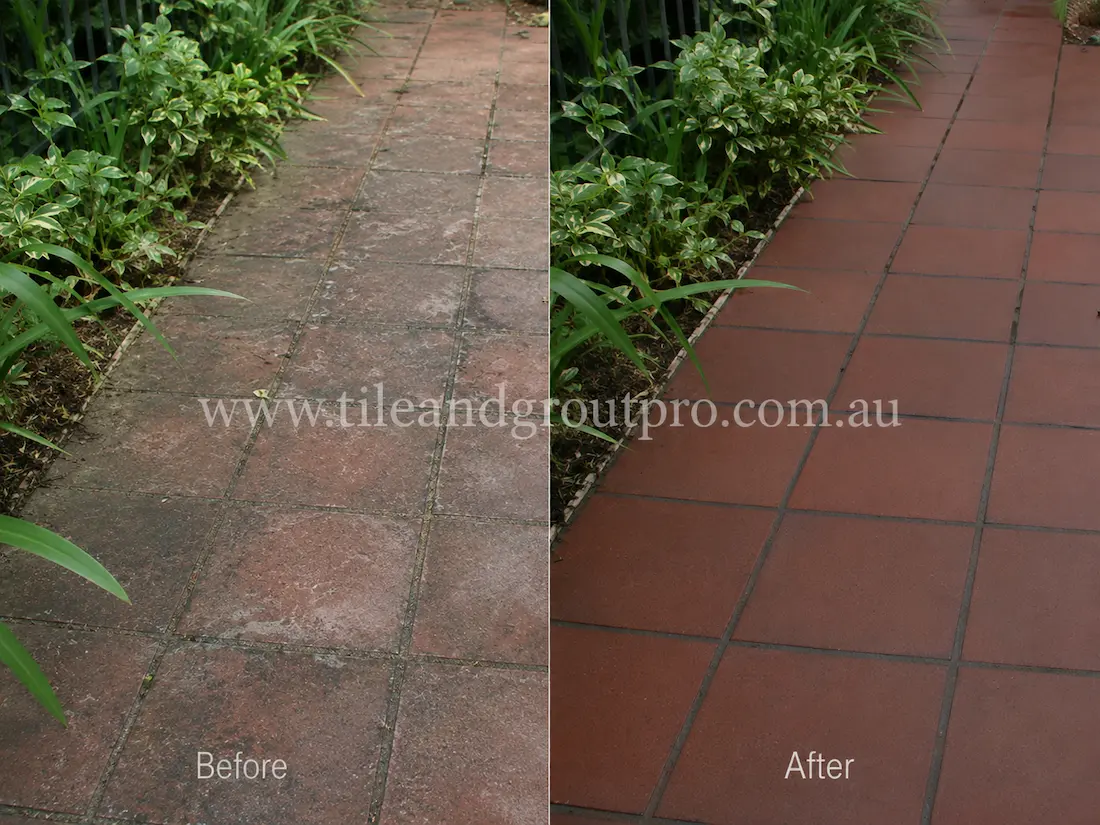 Outdoor garden pathway with quarry tiles covered in faded sealer, surface staining, and weathered buildup before Sealer Stripping cleaning.
