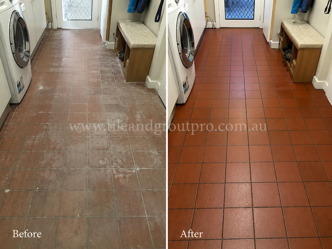 Laundry room with quarry floor tiles covered in sealer haze, dull discoloration, and traffic wear before professional Sealer Stripping cleaning.