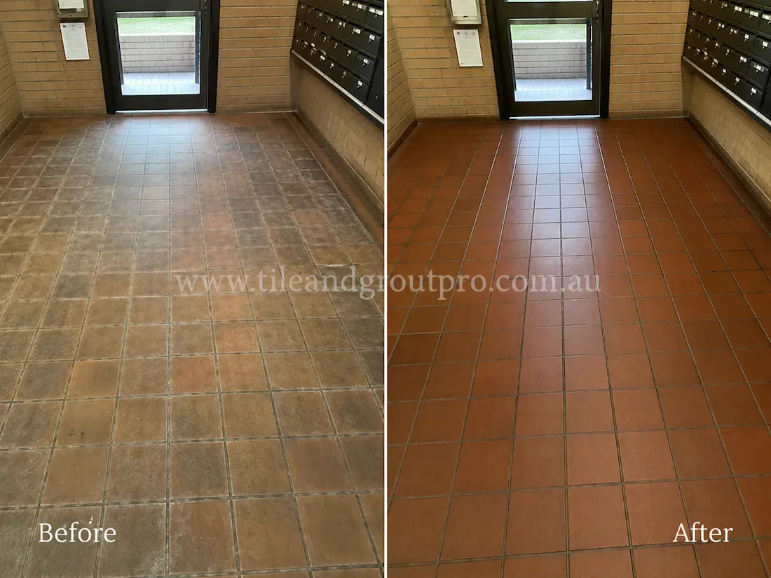 Apartment mailroom with quarry floor tiles showing faded sealer, embedded dirt, and uneven surface appearance before Sealer Stripping restoration.