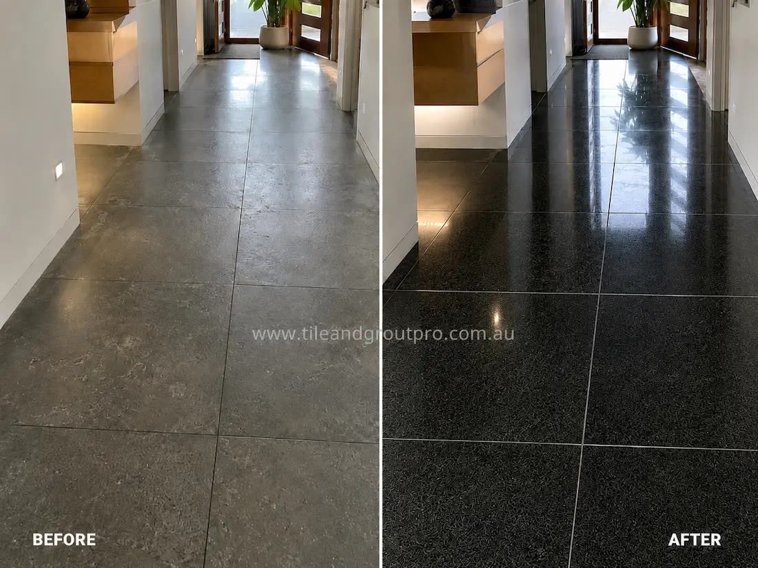 Before stone polishing, the black bluestone entry hallway floor had a dull, lightly scratched surface with low reflection in a modern residential corridor with timber cabinetry and natural light.