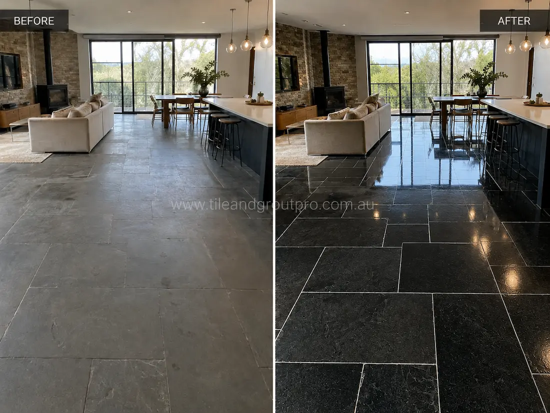 Before stone polishing, the black bluestone open-plan living and dining floor appeared faded and matte with visible wear and uneven sheen in a contemporary residential interior.