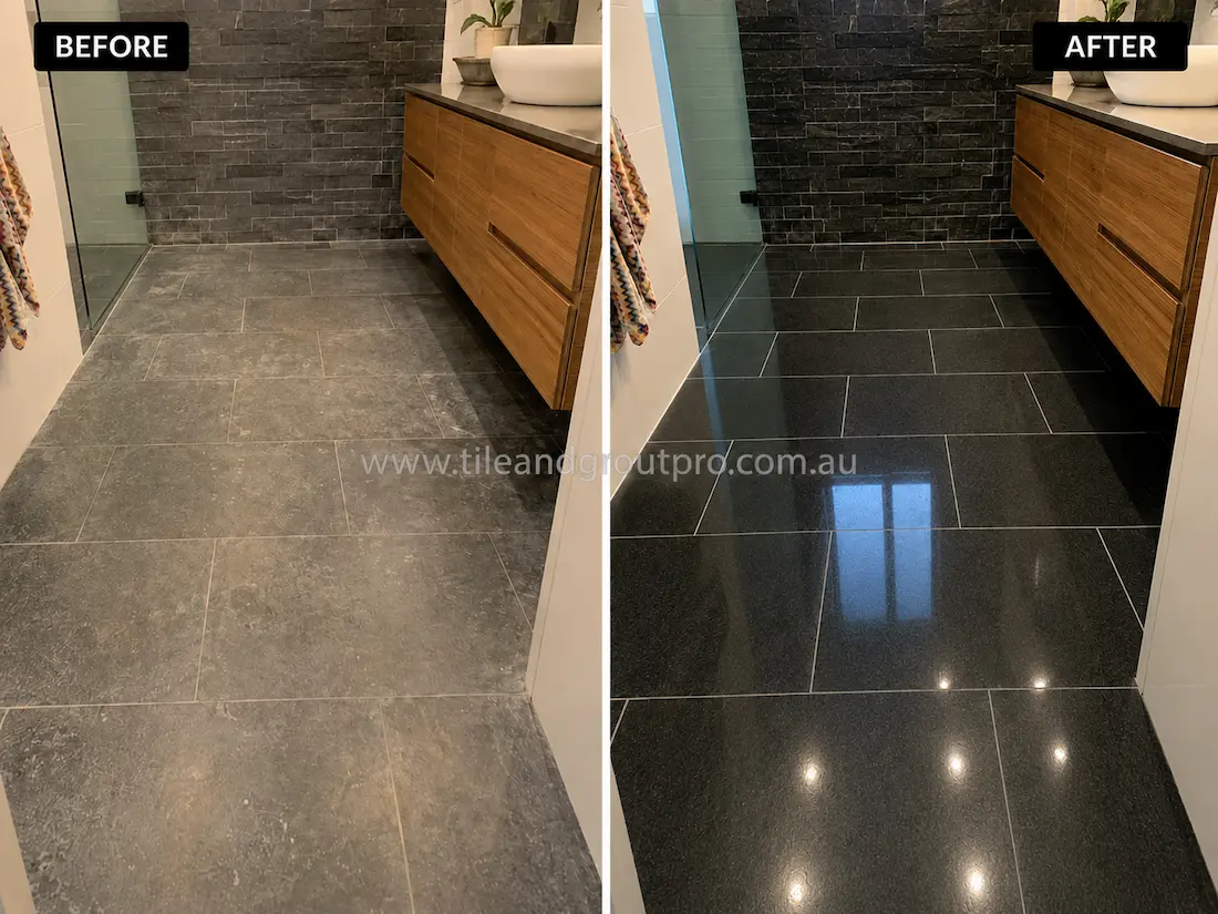 Before stone polishing, the bluestone bathroom floor looked cloudy and worn with minimal shine beside a timber vanity and dark stone feature wall.
