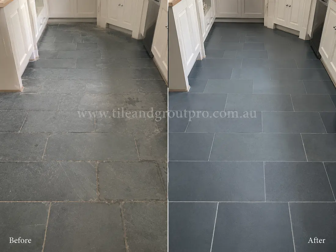 Indoor bluestone tile flooring in a residential kitchen area with visible wear, fading, and surface scratches before bluestone tile resurfacing and restoration.