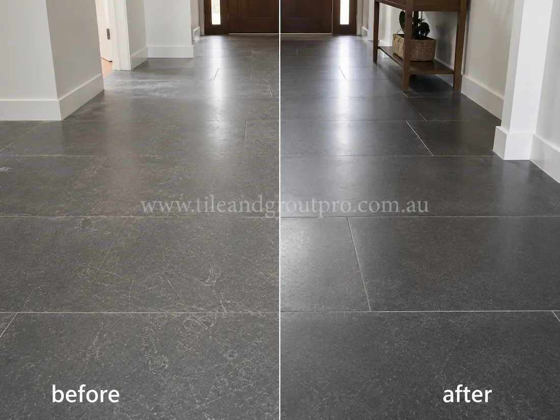 Interior hallway with dark bluestone floor tiles before and after scratch removal, showing visible scratches and dull wear restored to a refined smooth appearance near timber entry doors.