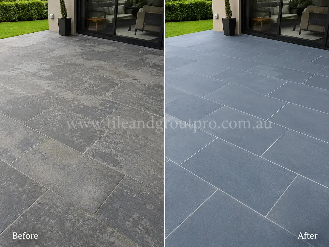 Residential outdoor patio with blue-grey bluestone pavers showing faded color, weathering, and surface dullness before professional bluestone tile resurfacing.