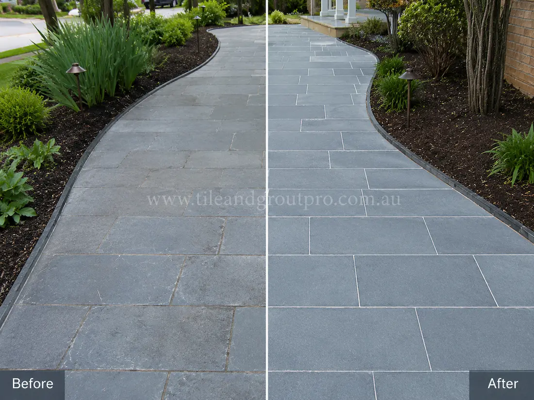 Residential garden walkway with blue-grey bluestone pavers showing weathering, surface fading, and loss of color before professional bluestone tile resurfacing.