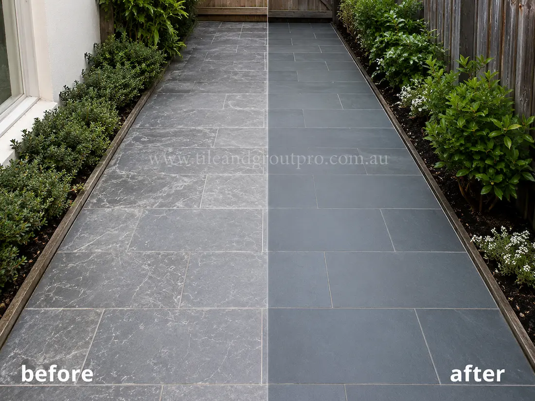 Outdoor garden pathway with dark grey bluestone tiles before and after scratch removal, showing faded scratched stone surfaces restored to a clean even finish between landscaped garden beds.