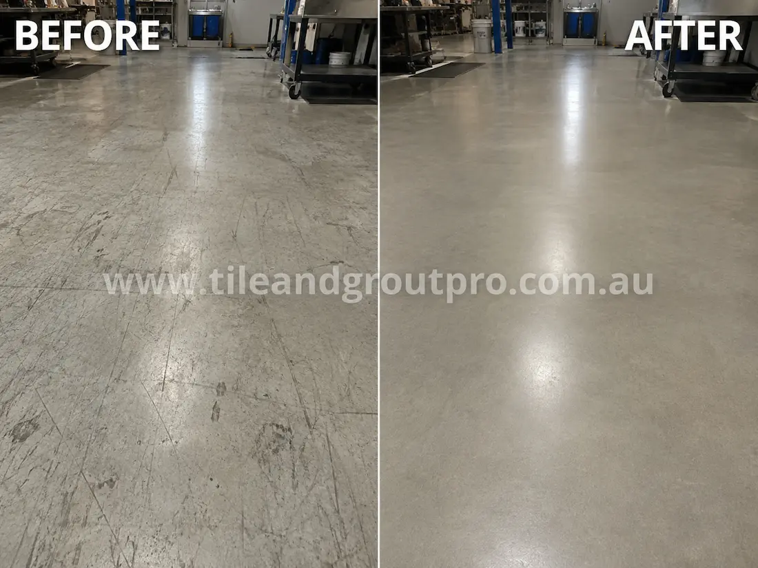 Industrial concrete workshop floor showing heavy scratches, abrasion marks, and surface wear before scratch removal and concrete restoration service.