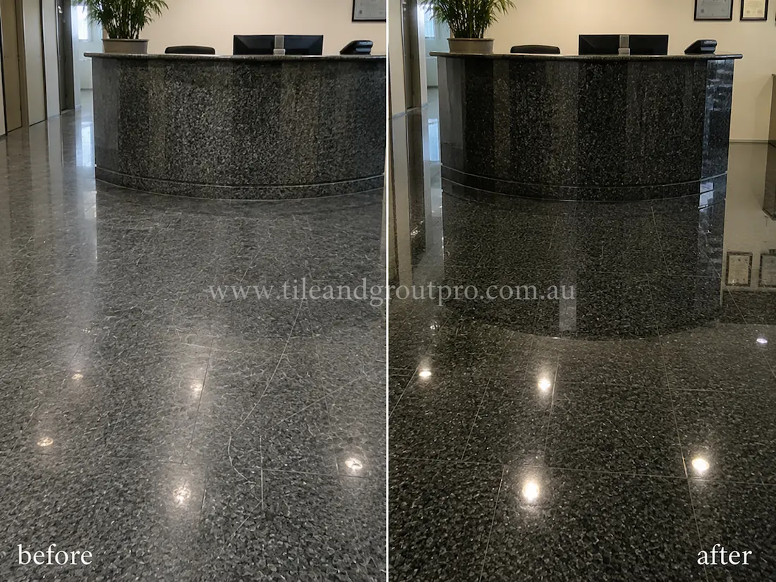 Commercial reception area with black granite floor tiles before and after scratch removal, showing dull scratched stone flooring restored to a glossy reflective surface.