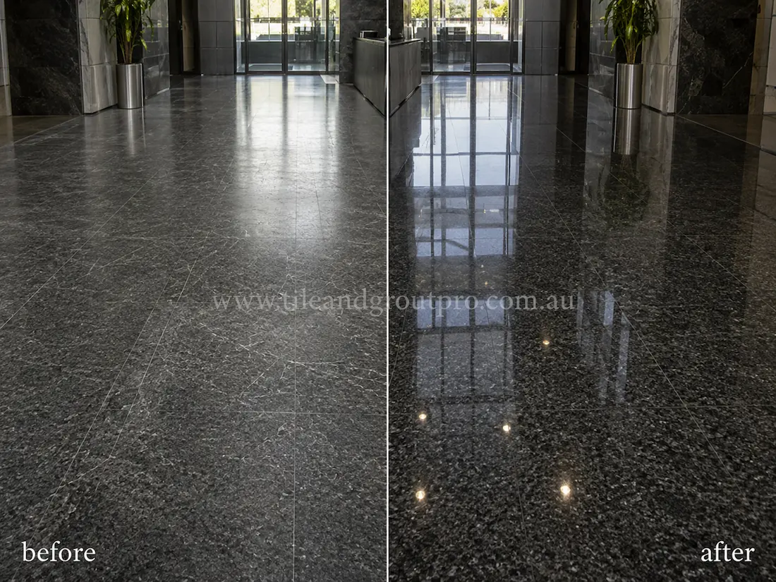 Commercial lobby with black granite floor tiles before and after scratch removal, showing heavily scratched stone flooring restored to a glossy mirror-like finish.