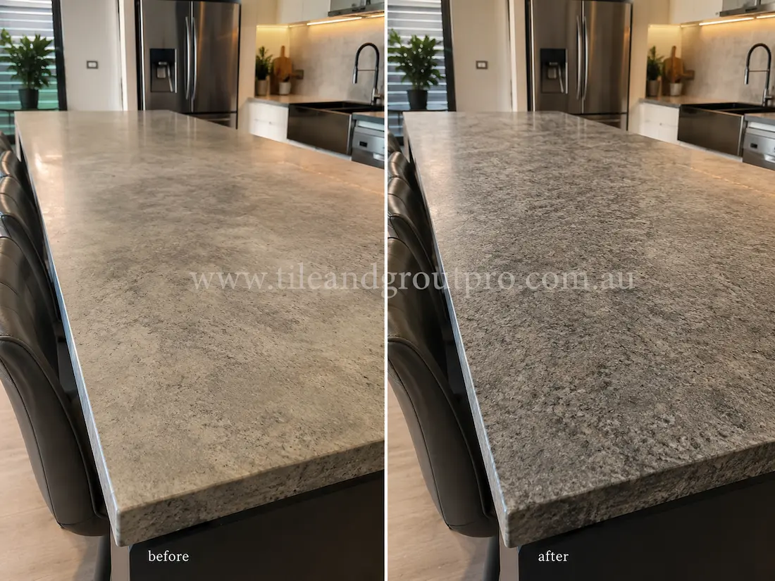 Before tile renewal, the granite kitchen island benchtop showed etching, dull patches, and uneven shine across the stone surface in the modern kitchen.