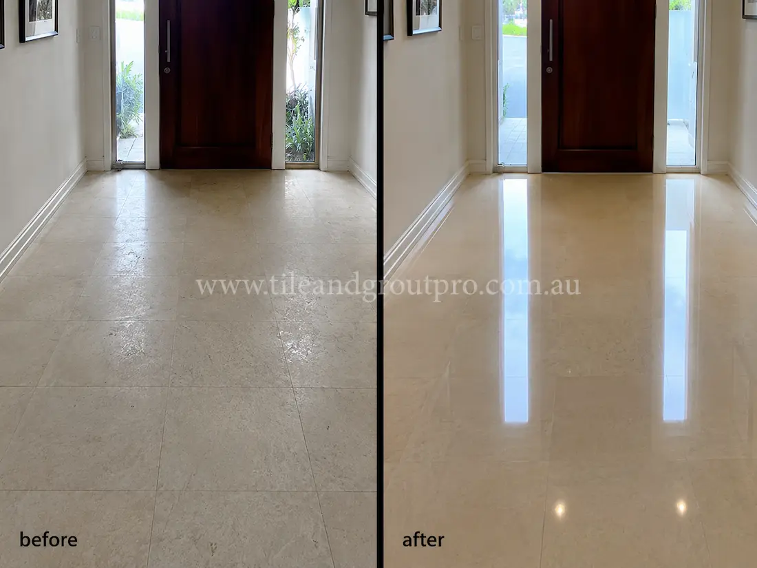 Beige limestone entryway floor tiles with dull finish and low reflectivity before professional stone polishing service.