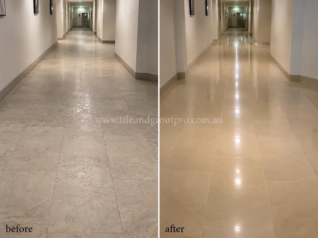 Long commercial hallway with beige limestone floor tiles showing dullness and surface wear before stone polishing treatment.