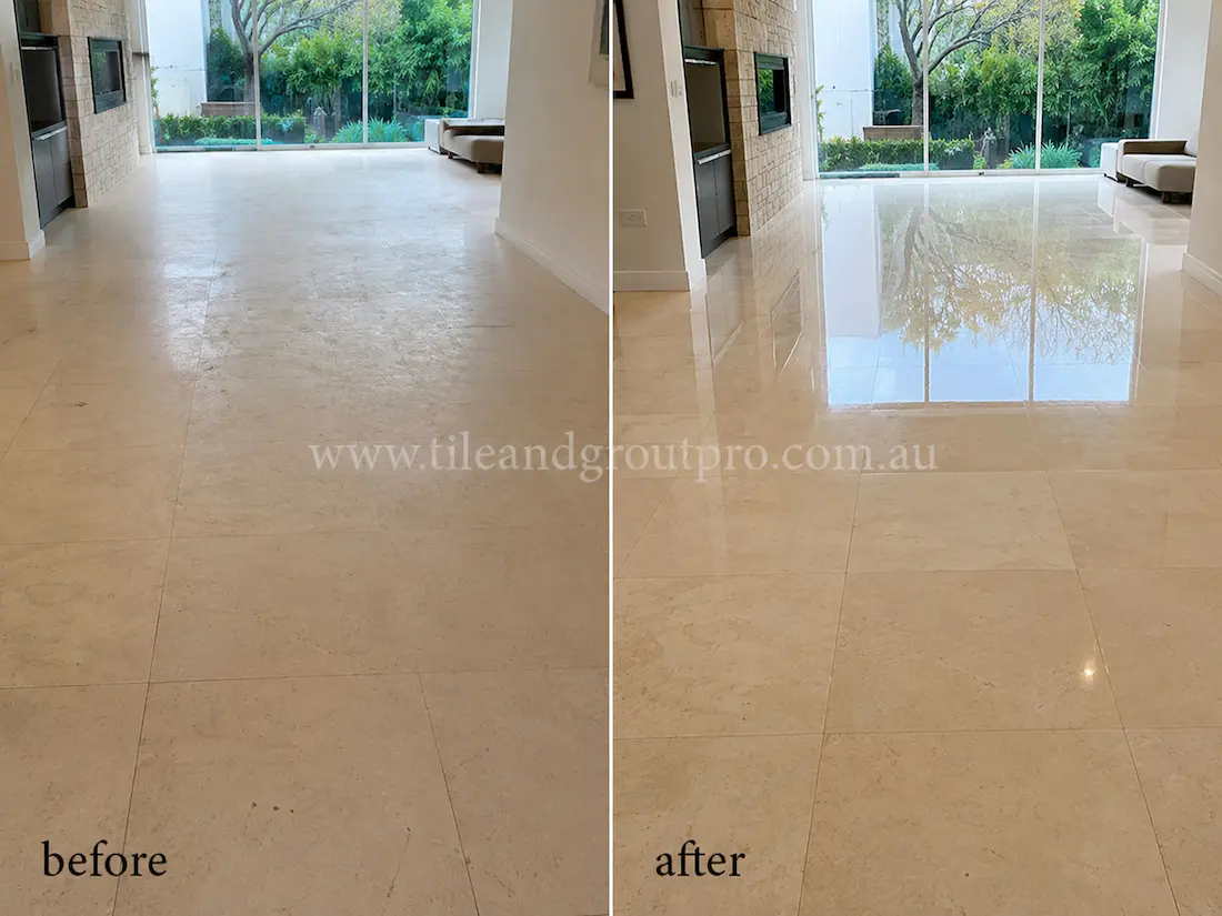 Beige limestone living room floor tiles with dull, low-sheen surface before professional stone polishing in a modern open-plan home.