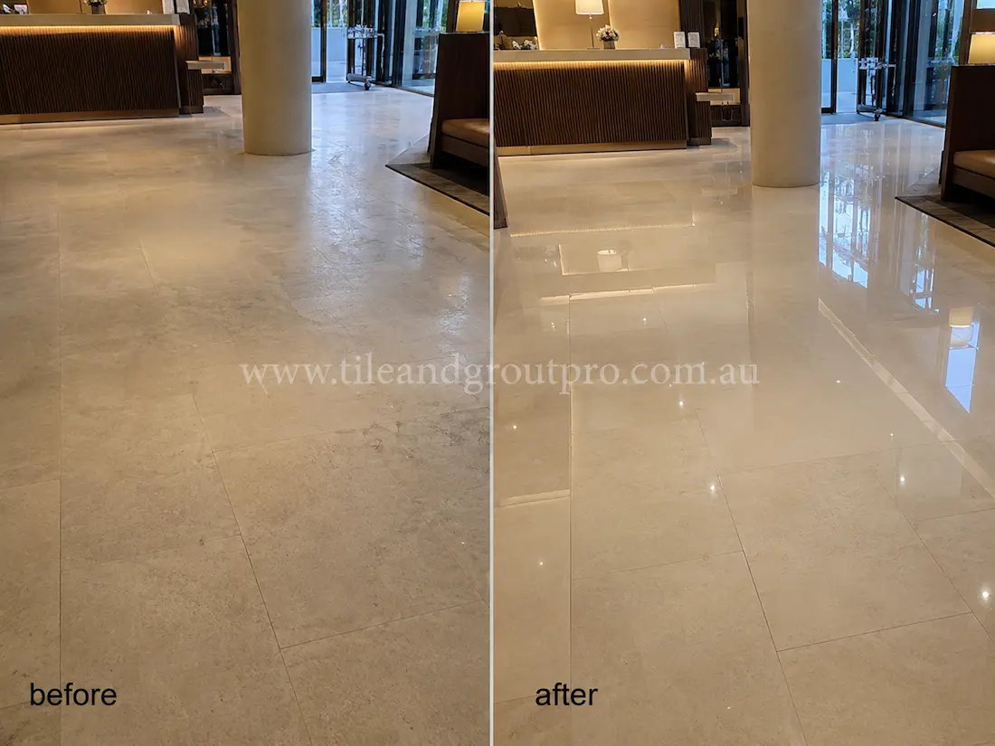 Beige limestone hotel lobby floor with cloudy finish and reduced gloss before professional stone polishing restoration.
