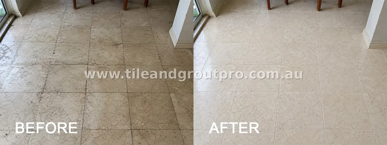 Marble living area floor tiles with embedded dirt, staining, and discolored grout across a high-traffic indoor space before cleaning