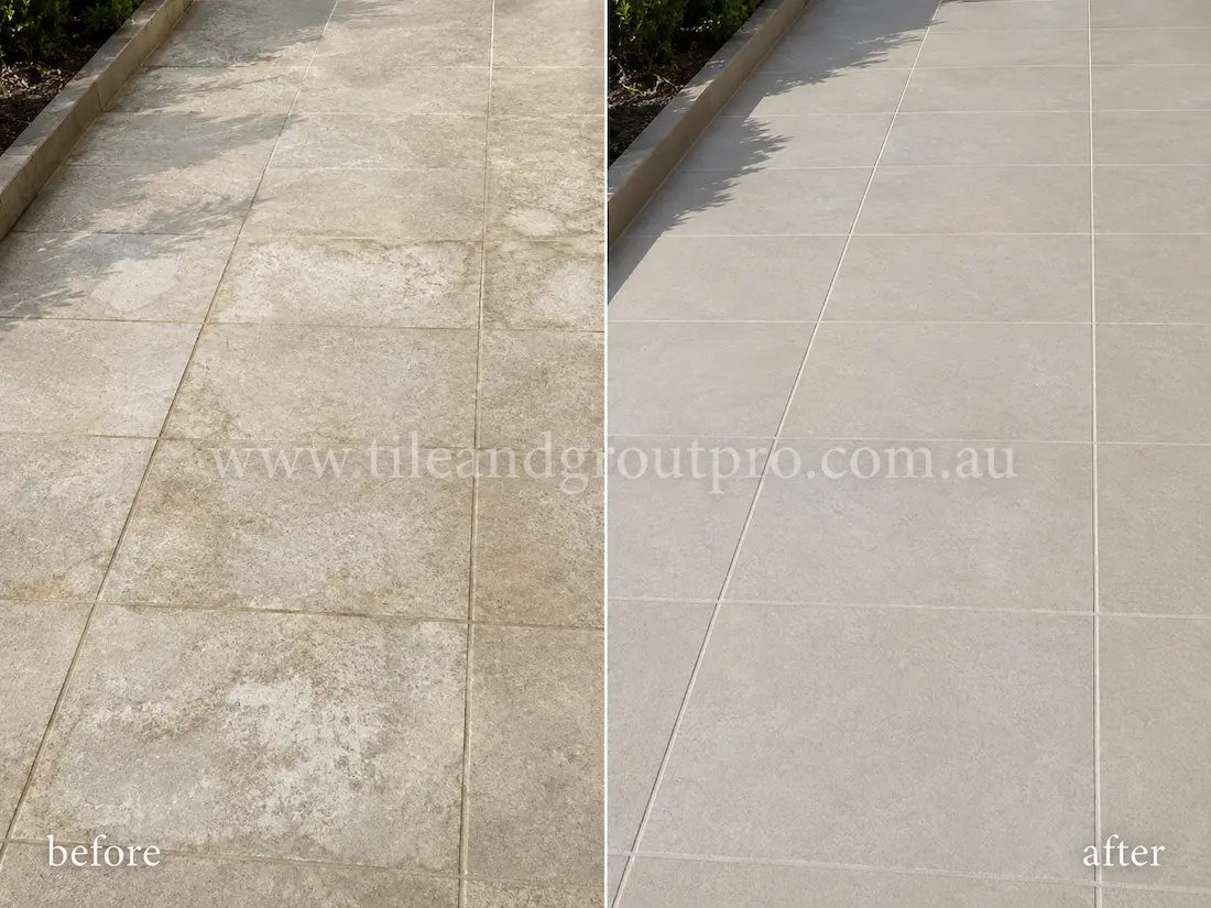 Outdoor patio with stone-look porcelain floor tiles before sealer stripping, showing faded sealer build-up, cloudy residue, and uneven colouring across the tiled pathway.