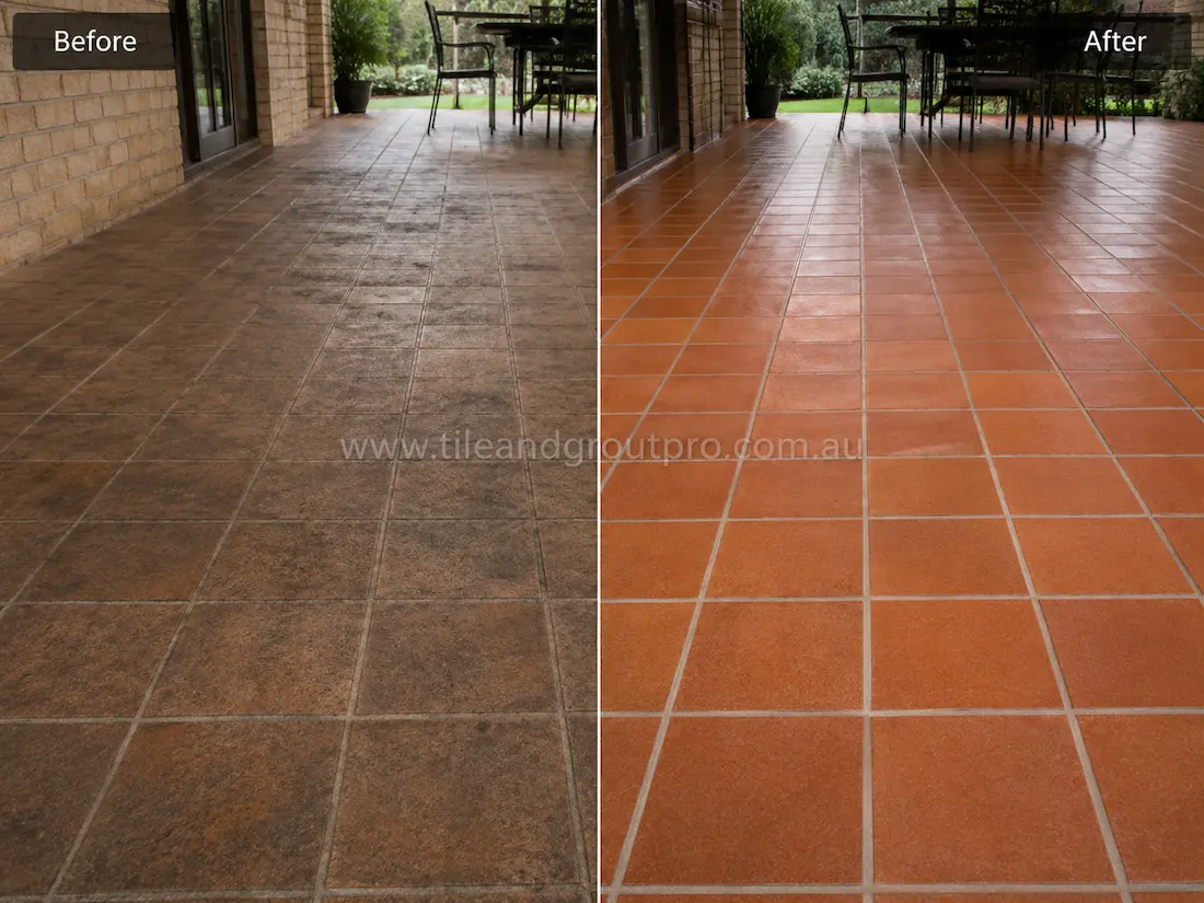 Before tile renewal, quarry floor tiles on a covered outdoor patio appeared weathered and dull with surface staining, traffic wear, and faded protective coating beneath an outdoor dining setting.