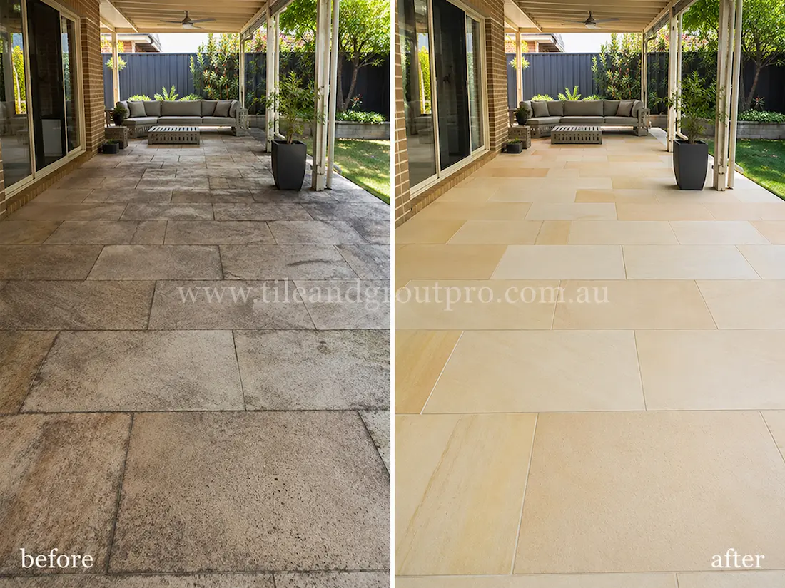 Before tile renewal, covered sandstone patio tiles in a backyard entertaining area showed surface grime, dull patches, and weathered natural stone flooring beneath outdoor seating and a covered pergola.