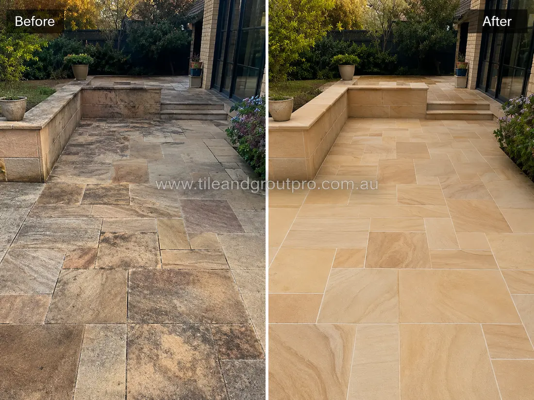 Before sandstone tile resurfacing, this residential courtyard and patio area shows multicolour sandstone tiles affected by dark staining, weather exposure, fading, and accumulated surface grime.