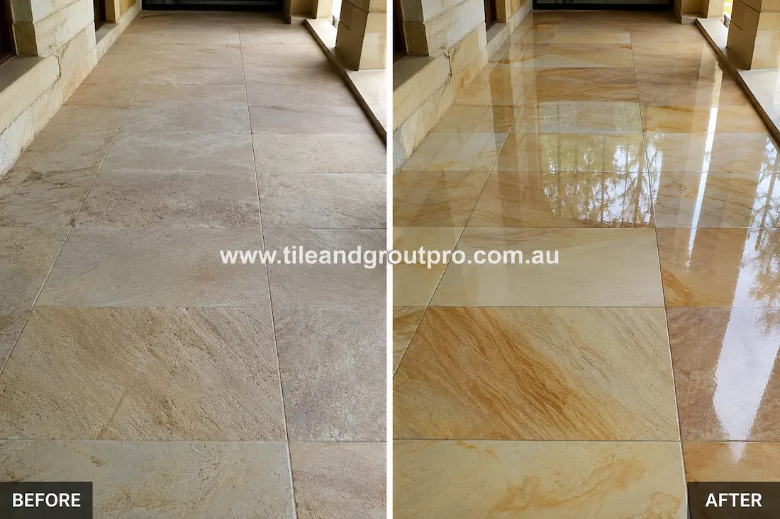 Before stone-polishing of sandstone floor tiles in a covered outdoor walkway with dull patches, surface wear, and faded natural stone colouring.