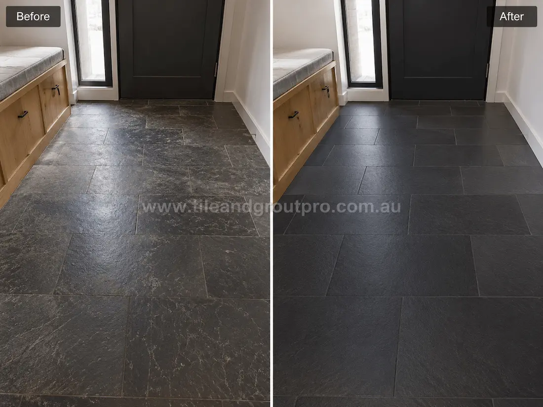 Before slate tile resurfacing, this mudroom entry features dark slate floor tiles with visible wear, faded colouring, surface scuffing, and a tired appearance around the doorway and built-in storage bench.