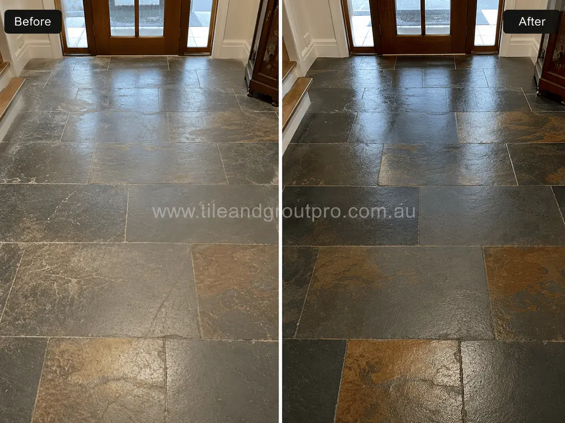 Before slate tile resurfacing, this residential entryway features dark multicolour slate floor tiles with faded colour, surface wear, dull patches, and reduced contrast around the front door area.