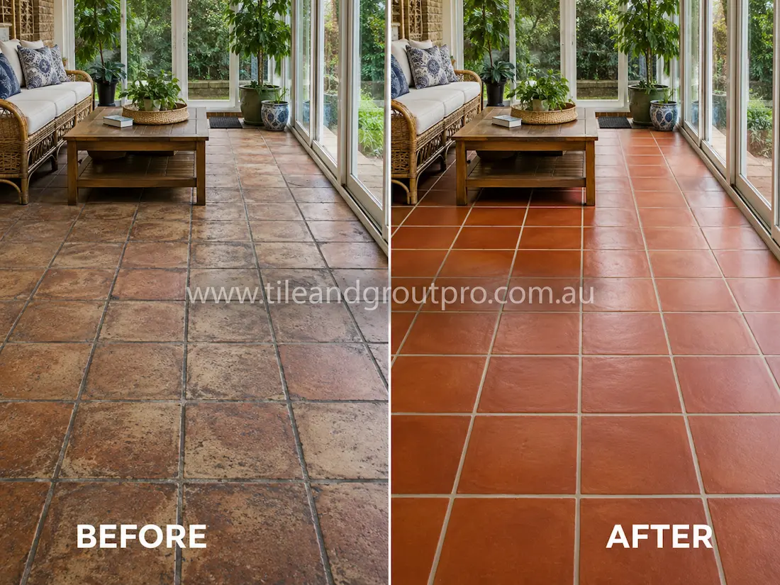 Before tile renewal, terracotta floor tiles in a sunroom displayed worn sealant, ingrained dirt, discolouration, and dull patchy surfaces beneath seating and indoor plants.