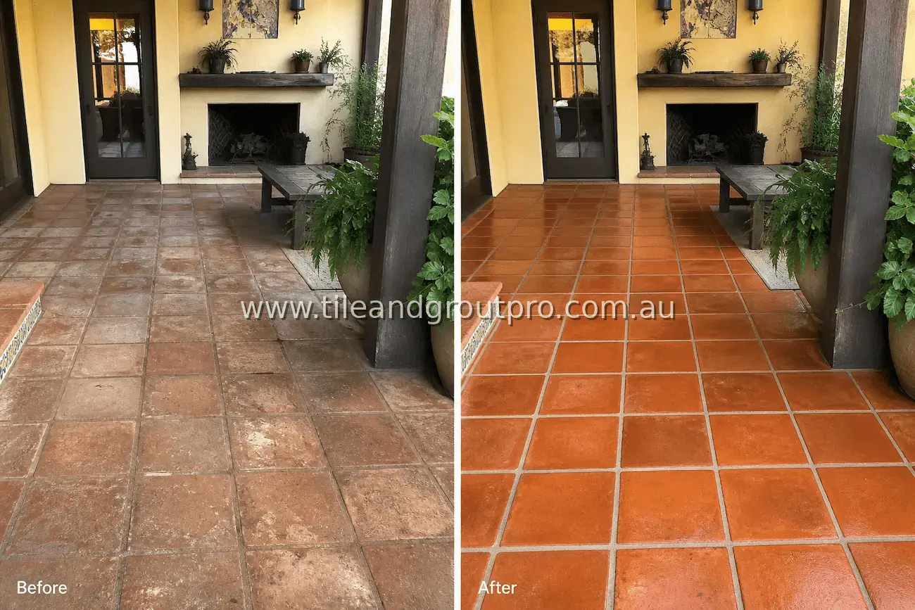 Terracotta tile covered patio floor near fireplace with dirt buildup, surface discoloration, and dark grout lines from outdoor exposure before cleaning