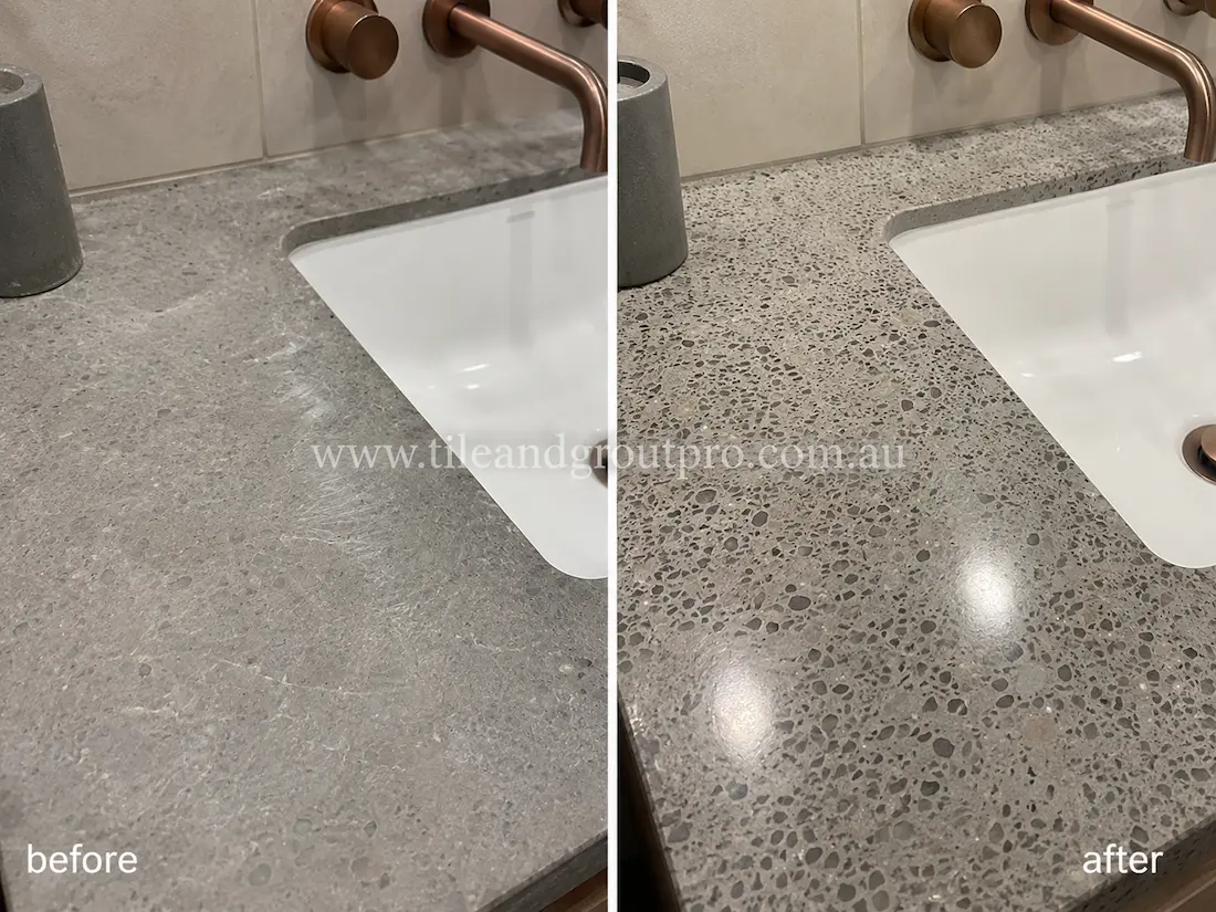 Bathroom vanity with grey terrazzo countertop before and after scratch removal, showing visible scratches and dullness restored to a polished glossy stone surface.