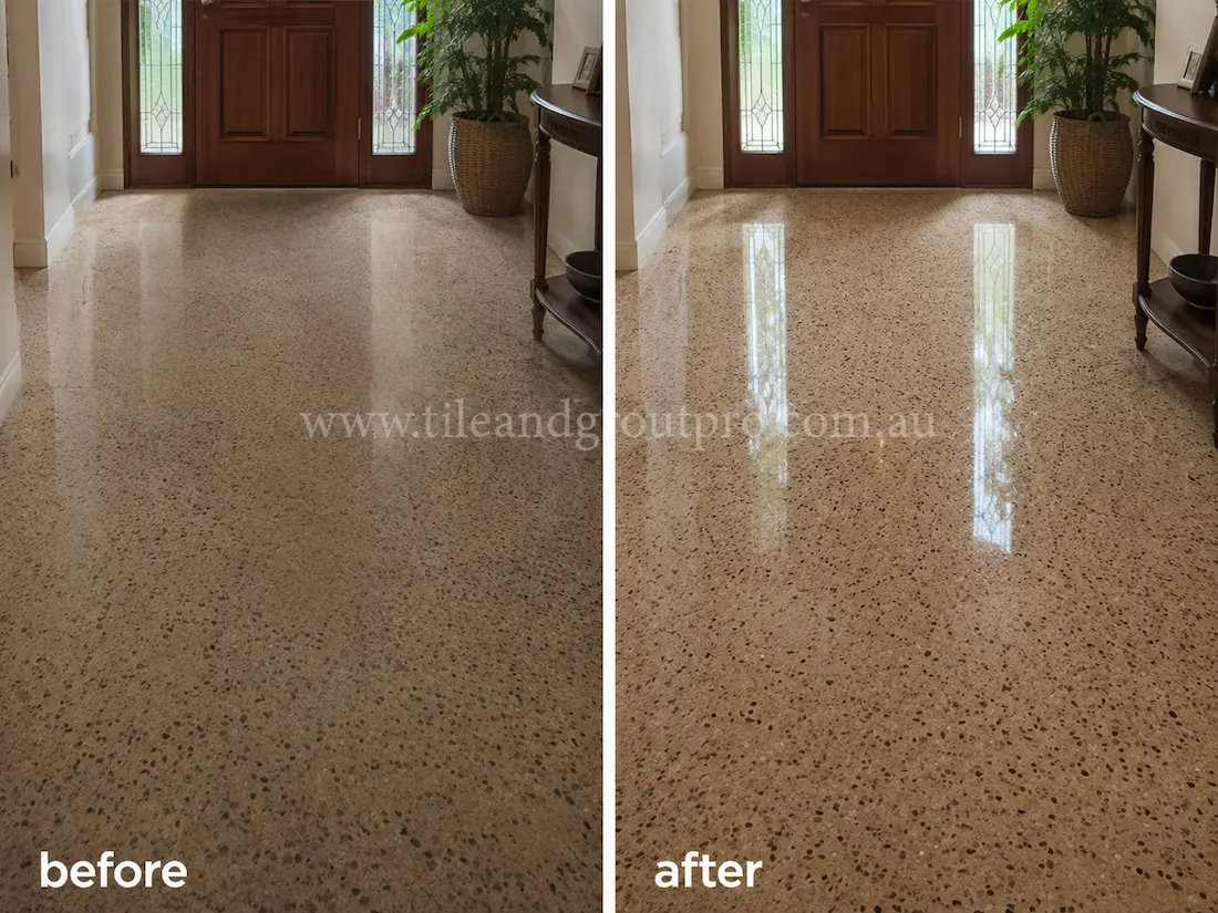 Before tile renewal, the residential terrazzo entry floor near the timber front door showed dullness, faded shine, and visible wear from foot traffic.