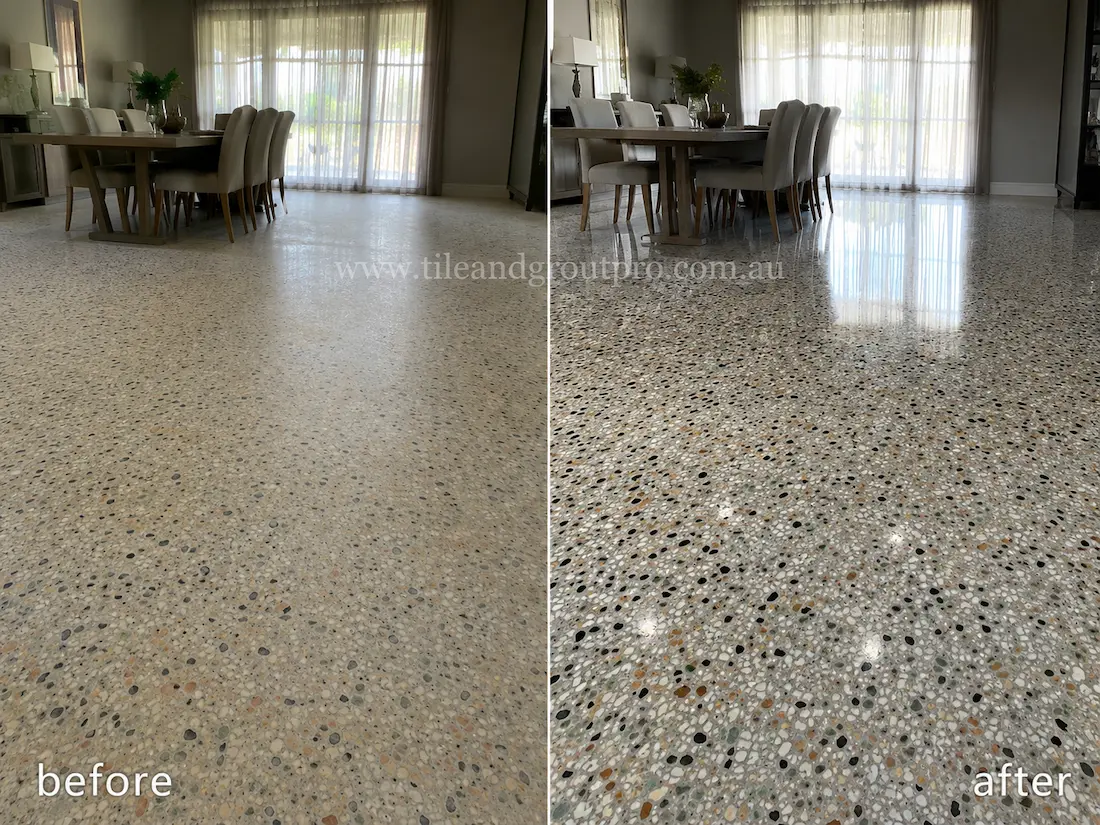 Before stone polishing, the terrazzo dining room floor appeared worn and flat with limited shine beneath a modern dining table and large sheer-curtained windows.