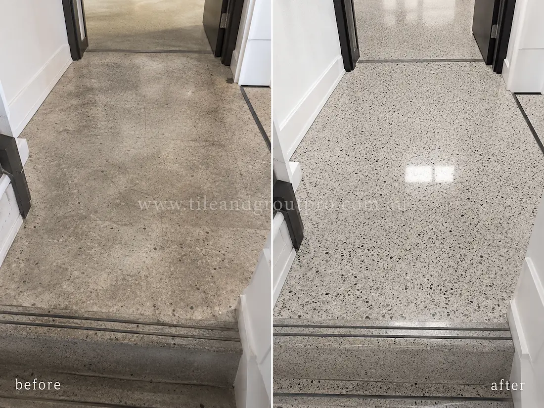 Long commercial hallway with terrazzo flooring affected by heavy foot traffic, surface wear, and loss of gloss before professional terrazzo tile resurfacing.