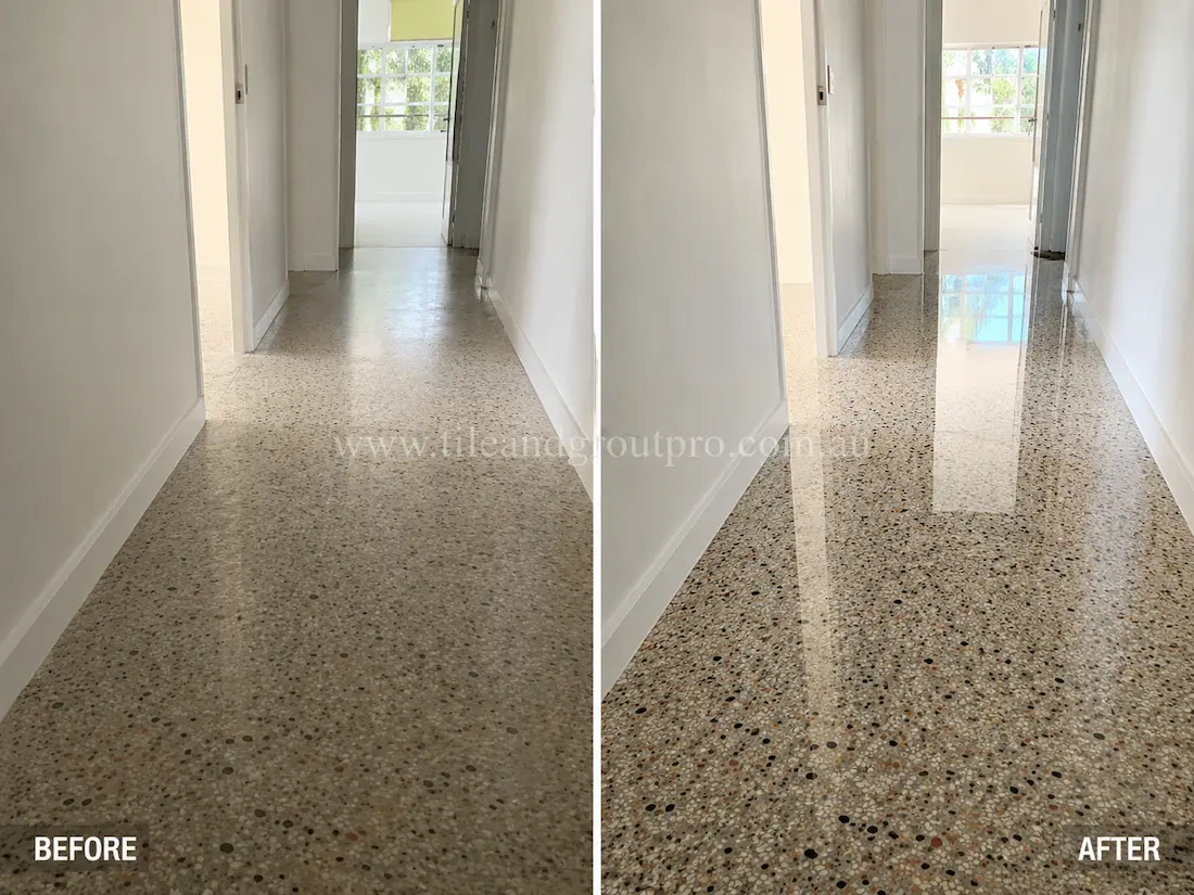 Before stone polishing, the terrazzo hallway floor looked faded and lightly worn with minimal reflectivity along a narrow residential corridor with white walls and doorways.