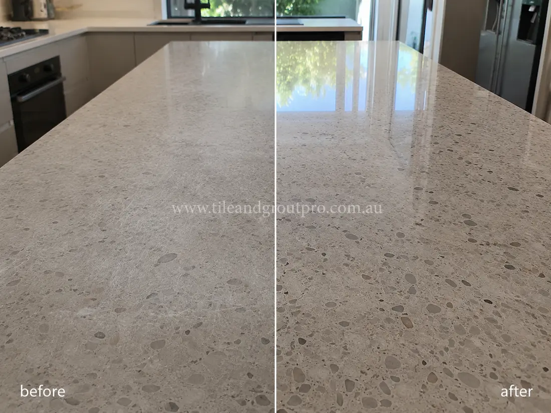 Modern kitchen island with terrazzo countertop before and after scratch removal, showing light scratches and haze restored to a glossy reflective stone finish.